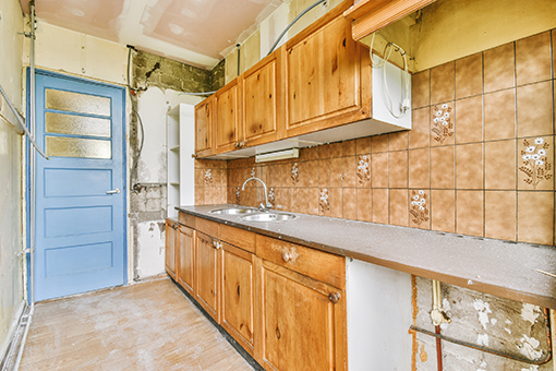 Kitchen of a Tampa Property With Cabinets Due For Painting For a Refreshed Look