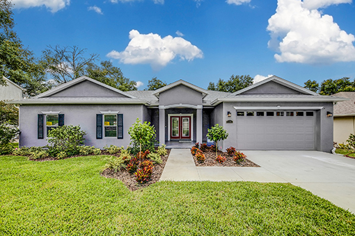 Exterior of a Residential Property in Carrollwood Florida After House Painters Painted It Gray