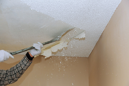 Florida Painter Removing Popcorn Ceiling at an Old House in Tampa