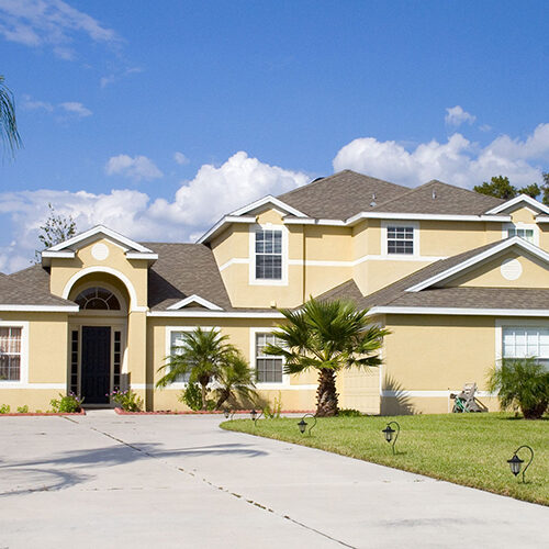 Yellow Exterior of a Tampa Florida House As Instructed by Homeowner To Painters